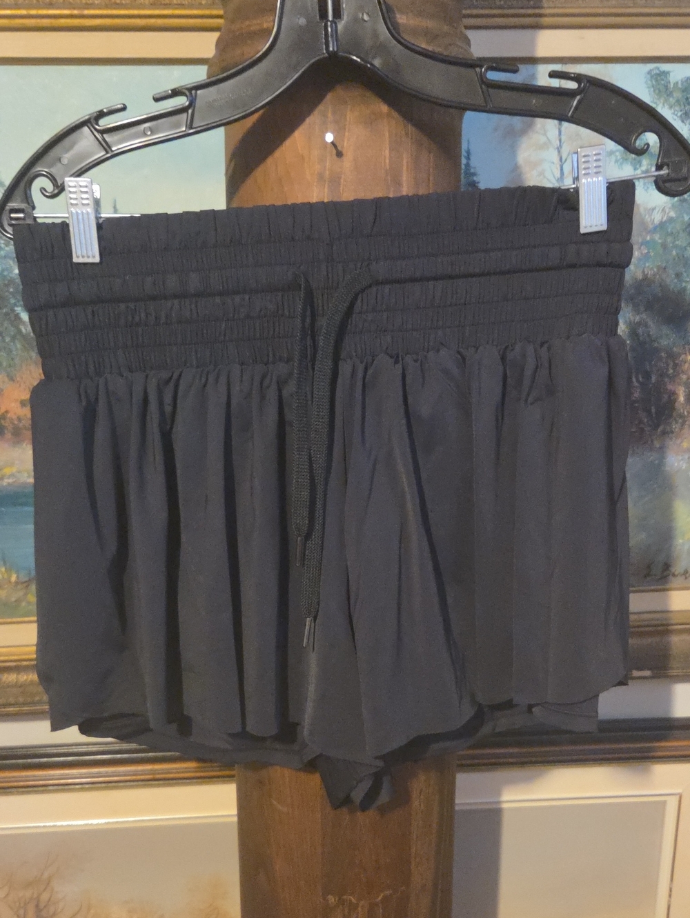 Black Smocked Waist Ruffle Shorts